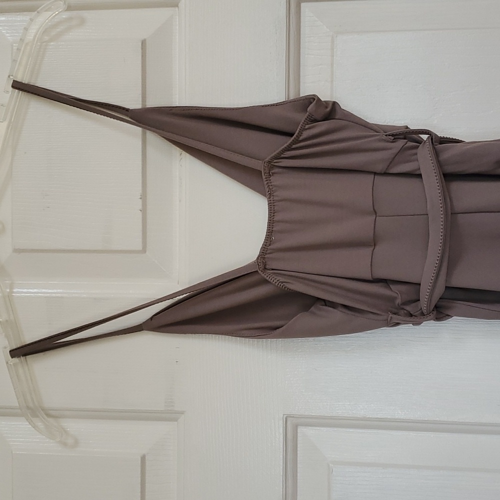 Size small jumpsuit. - Picture 4 of 10